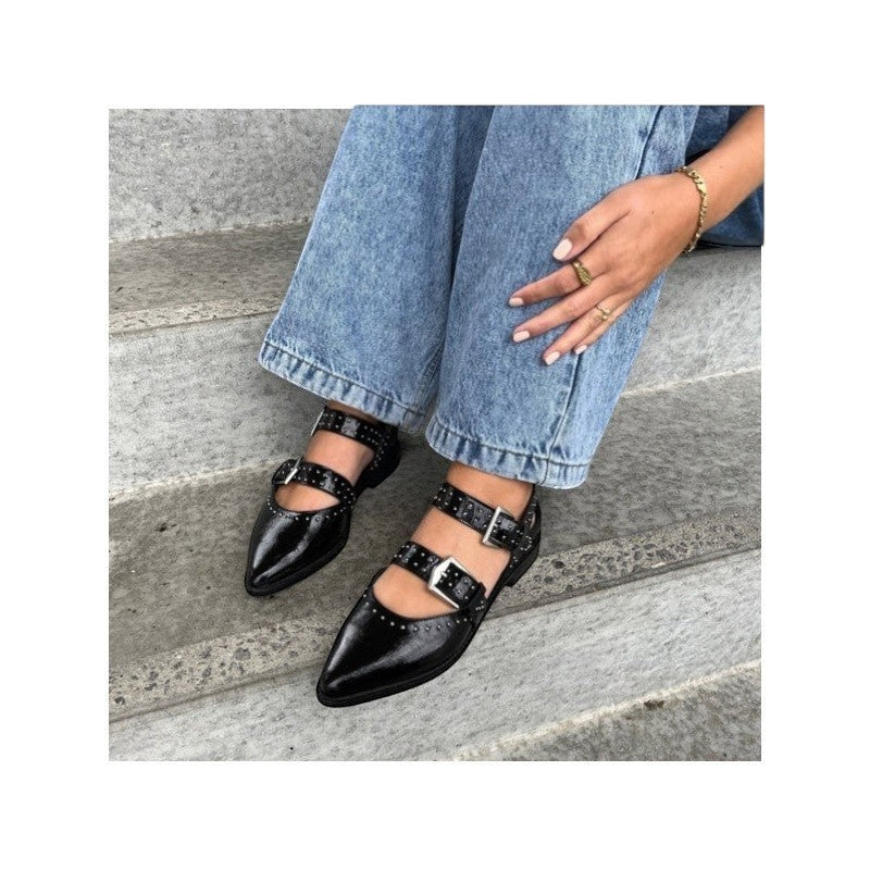 My Store black patent leather pointed-toe flats with double buckle straps and stud details.