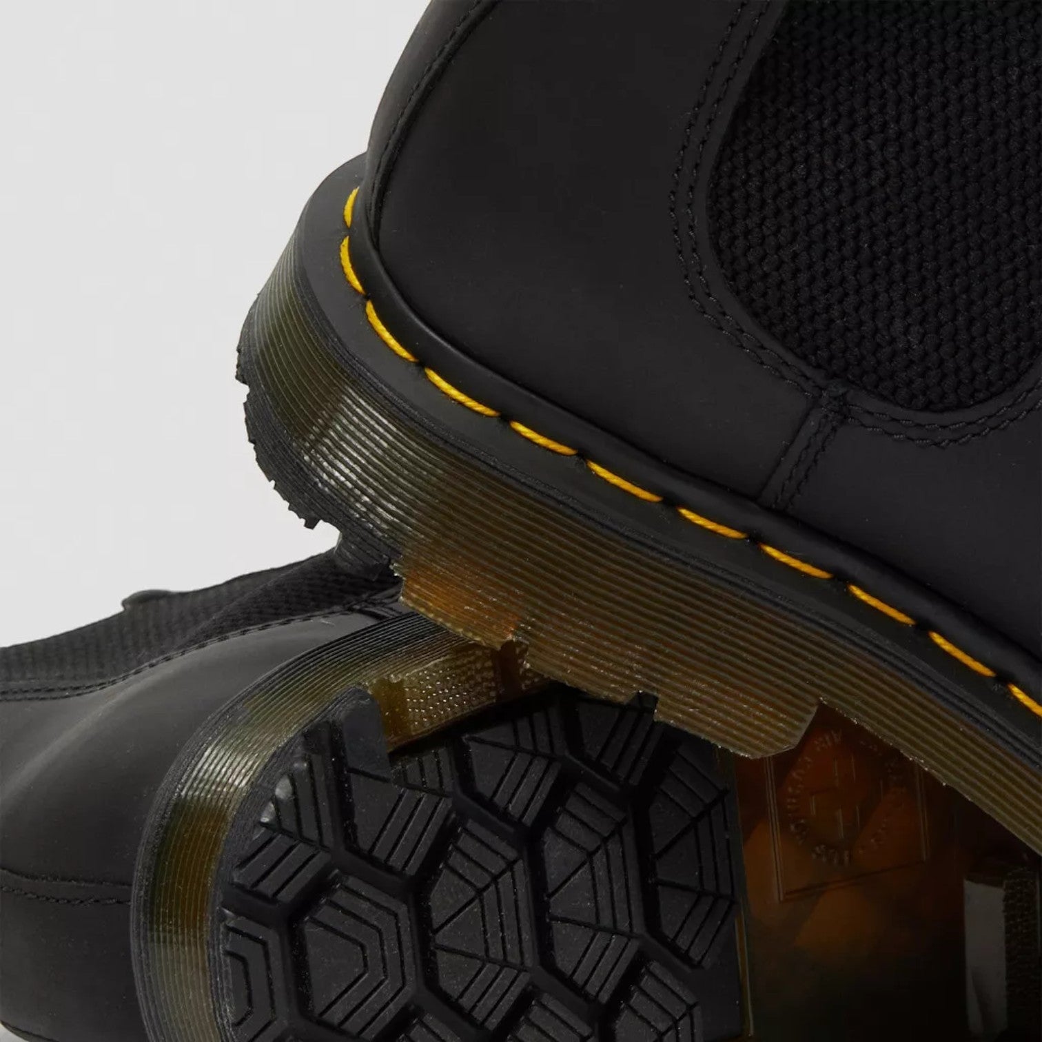 My Store black waterproof leather Chelsea boots with yellow stitching and a durable PVC sole with Wintergrip tread.