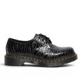 My Store black leather 1461 Zebra Emboss Smooth shoes with embossed zebra pattern and yellow stitching.