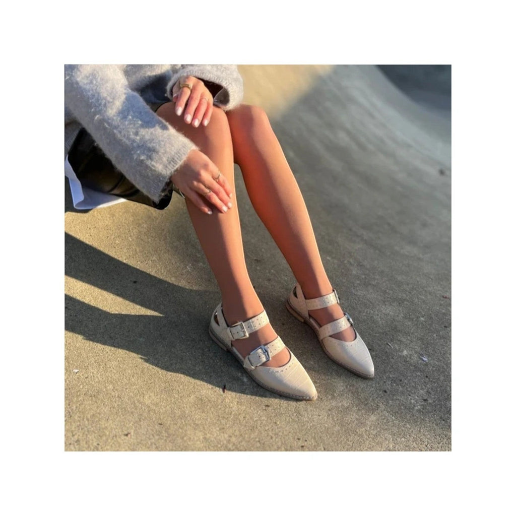 My Store cream leather pointed-toe flats with double buckle straps and stud details.