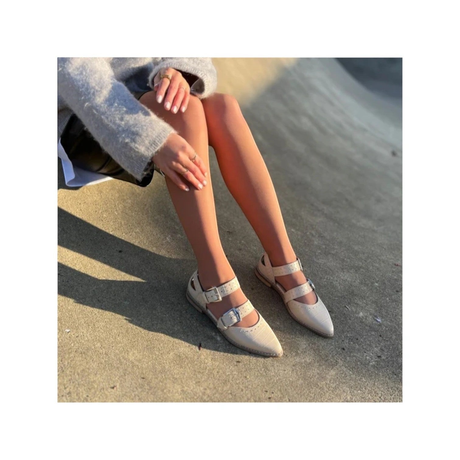 My Store cream leather pointed-toe flats with double buckle straps and stud details.