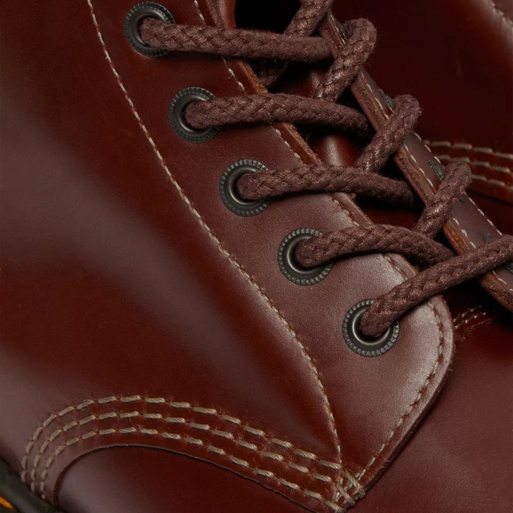 My Store Dr. Martens 1460 Abruzzo Leather boots in dark red, featuring a smooth leather finish and classic yellow stitching.