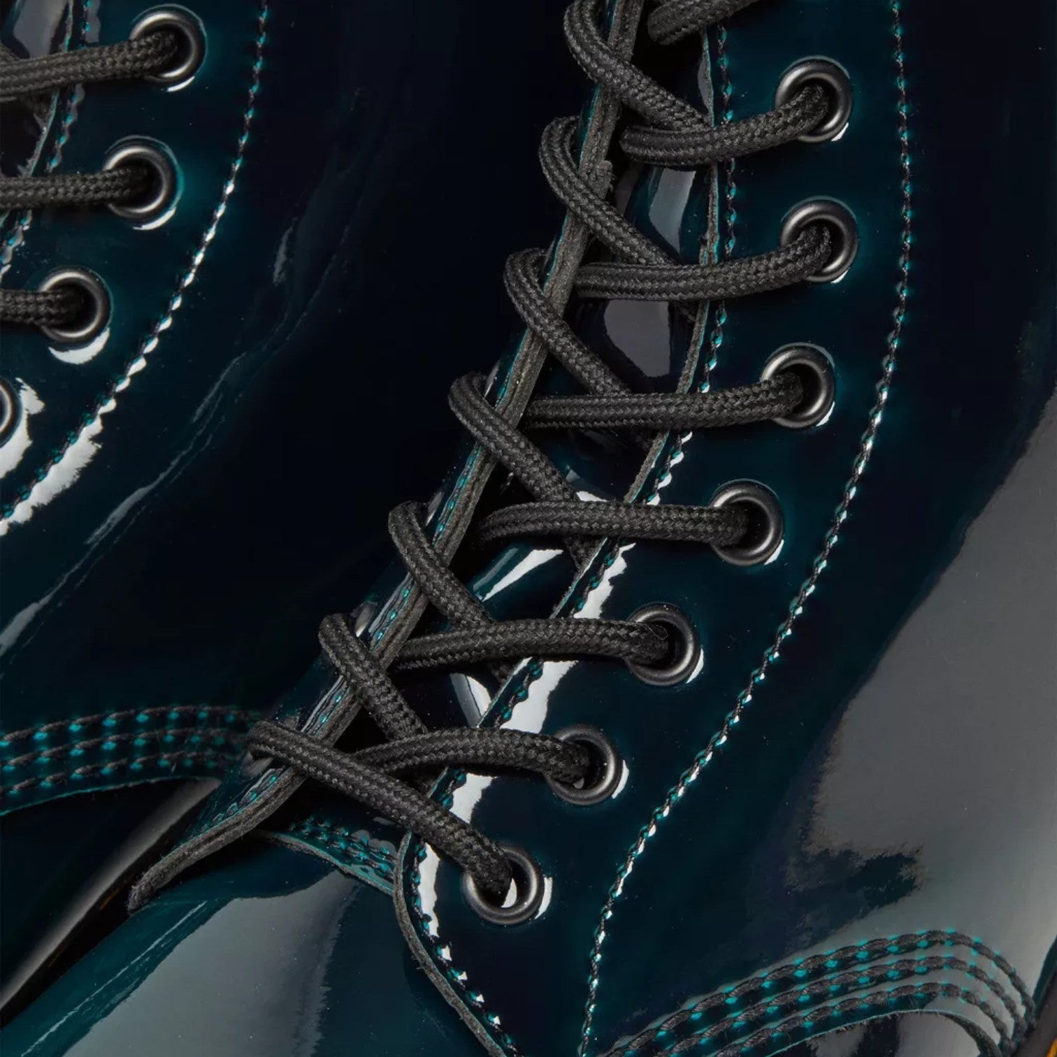 My Store Dr. Martens 1460 Gloss Vegan teal patent leather boots with black laces and yellow stitching.