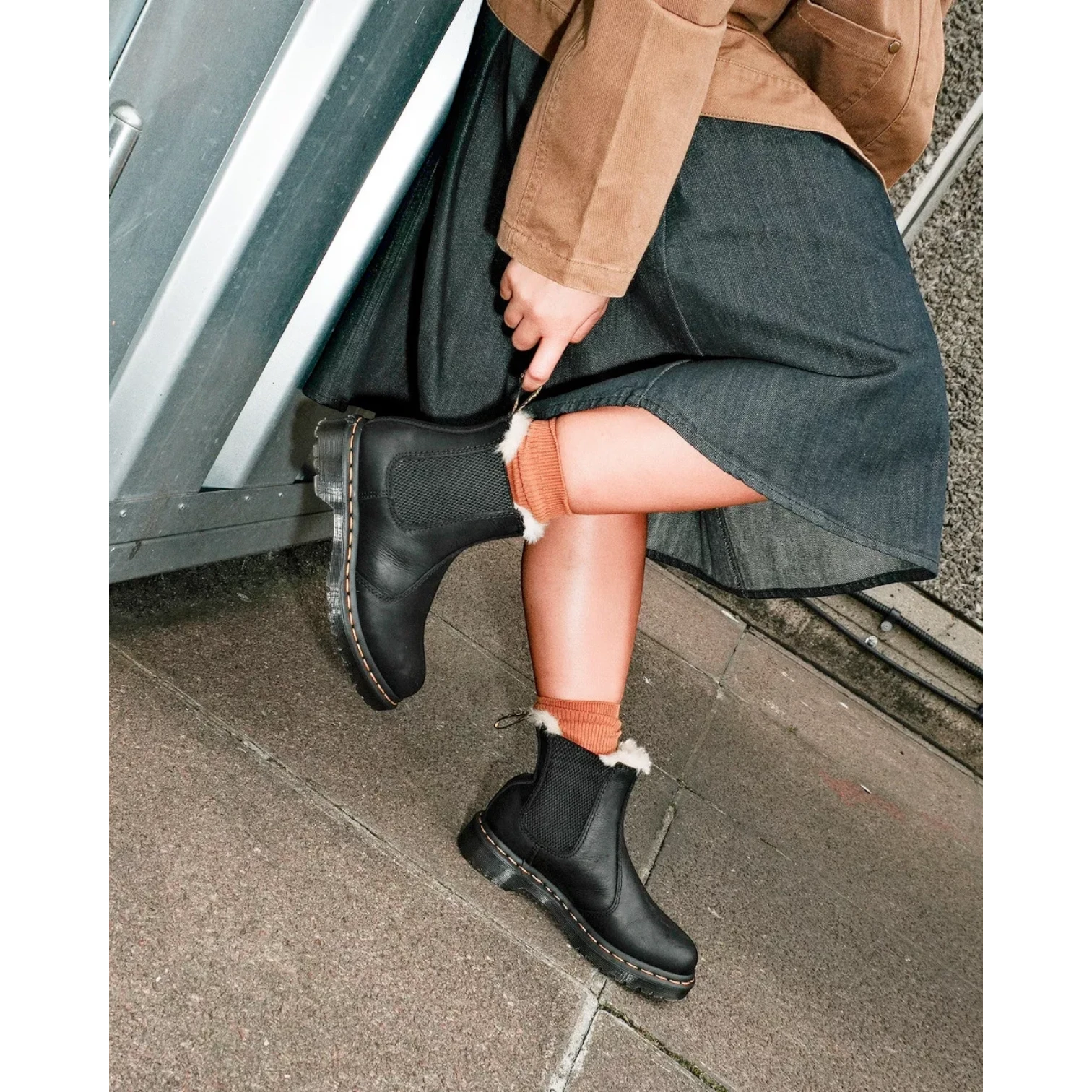 My Store Dr. Martens 2976 Leonore faux fur lined black leather Chelsea boots with elastic side panels and PVC sole.