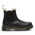 My Store Dr. Martens 2976 Leonore black faux fur lined leather Chelsea boots with yellow stitching and a PVC sole.