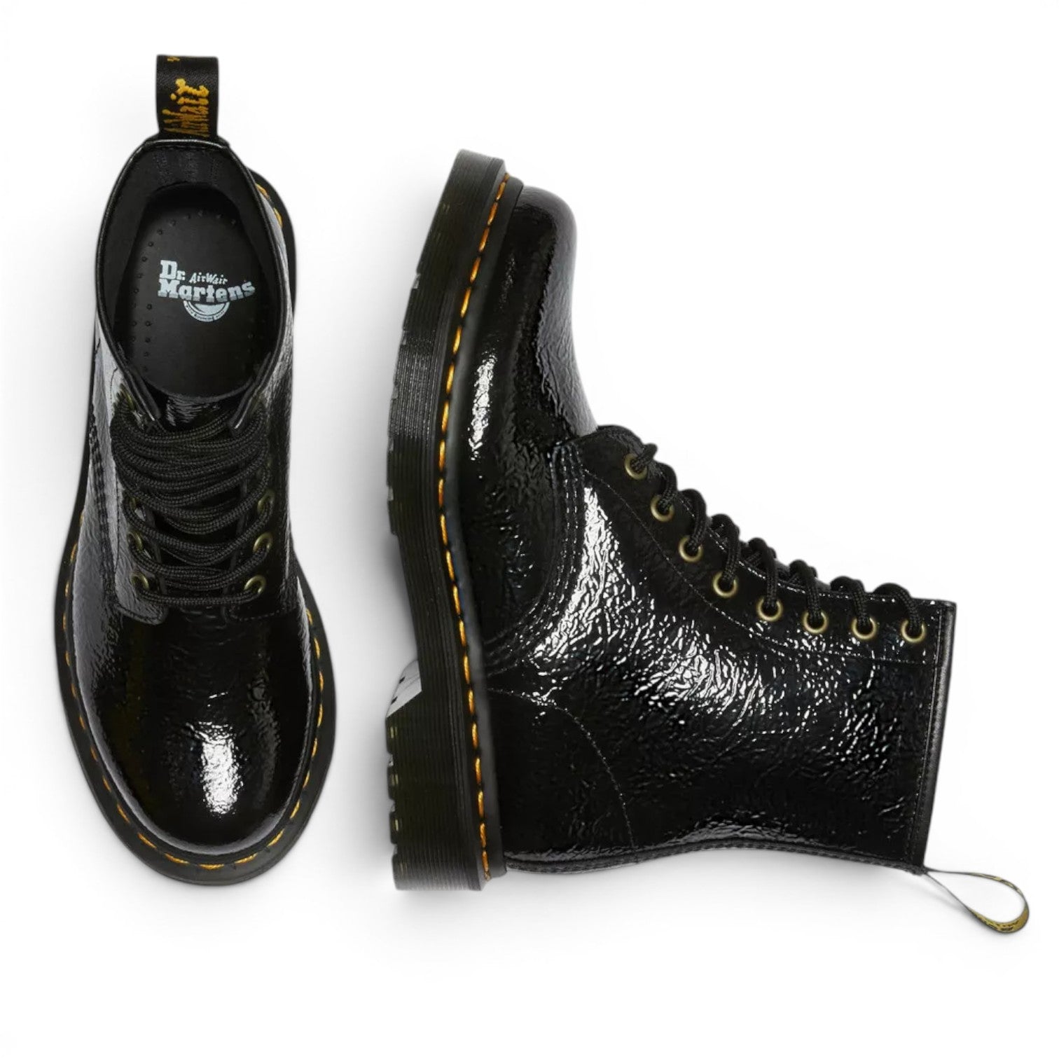 My Store Dr. Martens 1460 black patent leather distressed ankle boots with yellow stitching and lace-up closure.