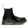 My Store Dr. Martens 2976 black patent leather Chelsea boots with elasticated side panels and yellow stitching.