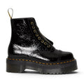 My Store Dr. Martens Sinclair black distressed patent leather platform boots with front zip and laces.