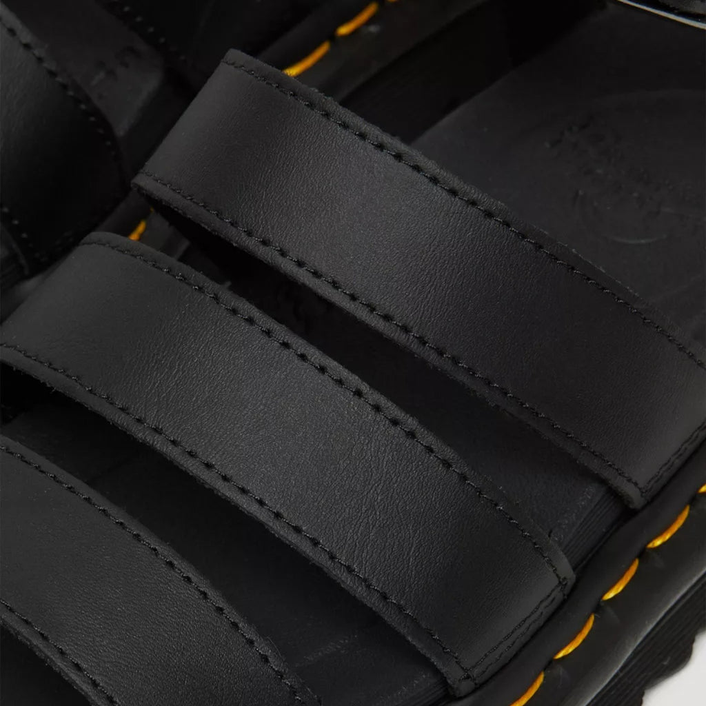 My Store Dr. Martens Blaire Hydro Leather black sandals with adjustable straps and yellow stitching.