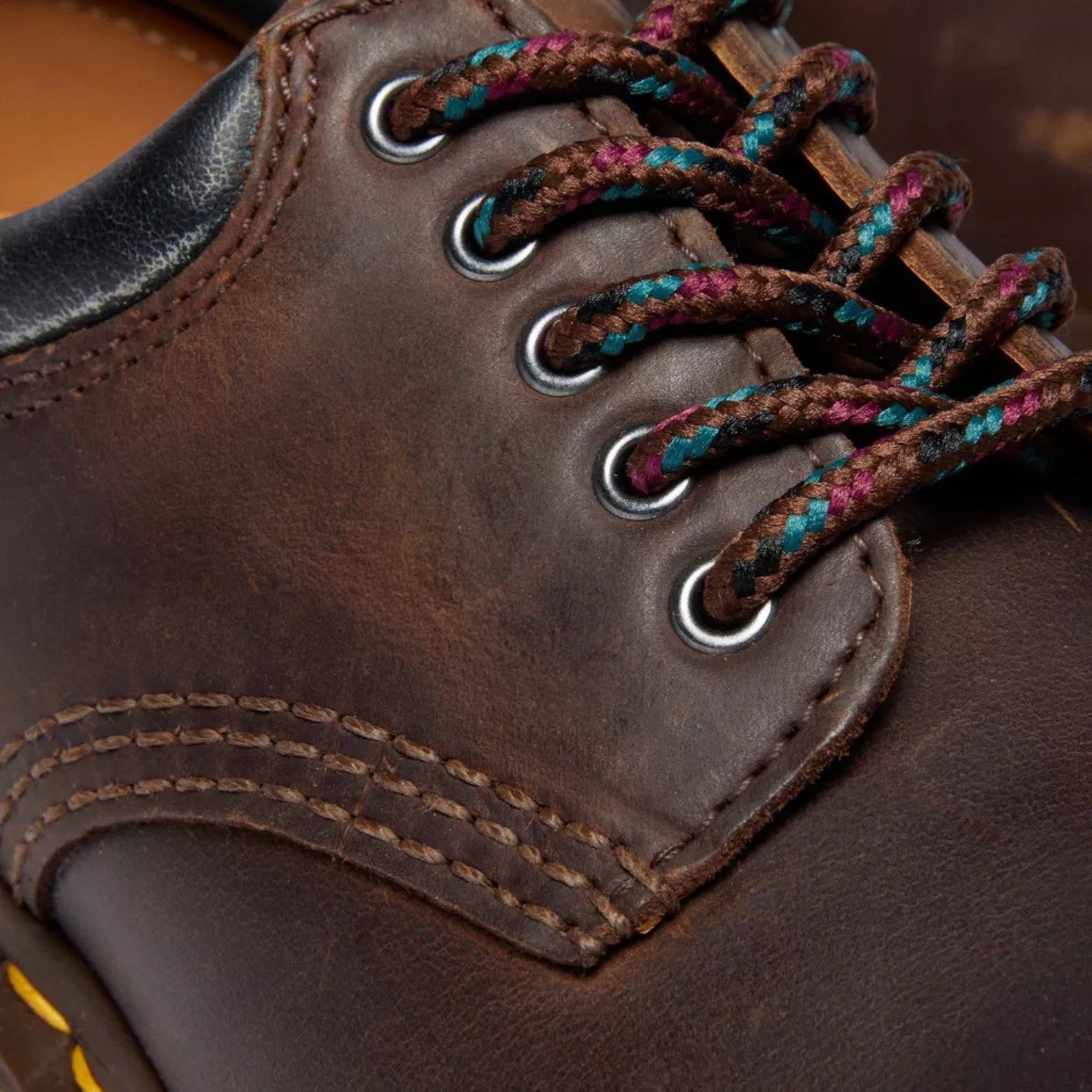 My Store Dr. Martens 8053 Crazy Horse leather shoes in dark brown with multi-colored laces and silver eyelets.