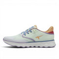 My Store Tamaris light green textile sneakers with purple and orange accents, featuring a breathable mesh upper and a thick, wavy rubber sole.
