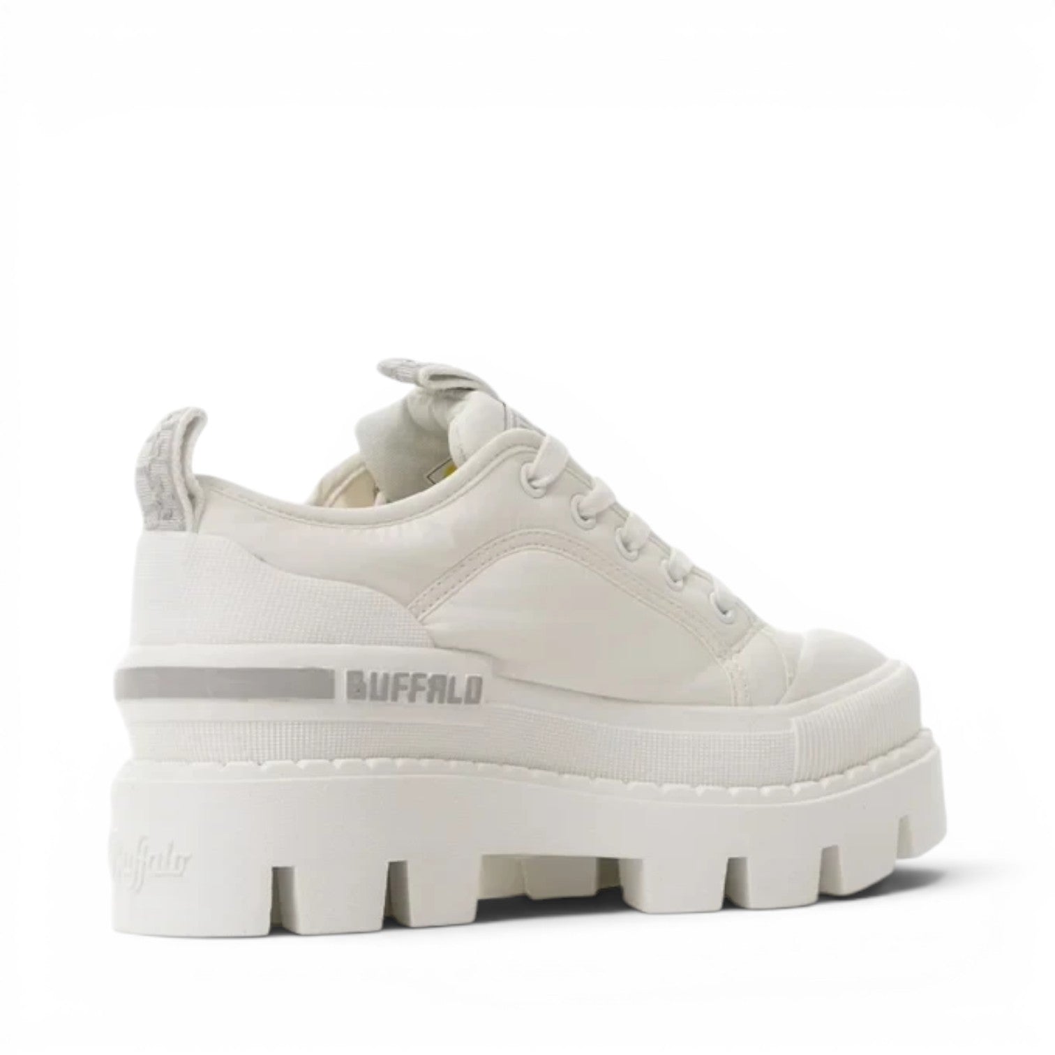 Buffalo white platform sneakers with a chunky sole and lace-up closure.