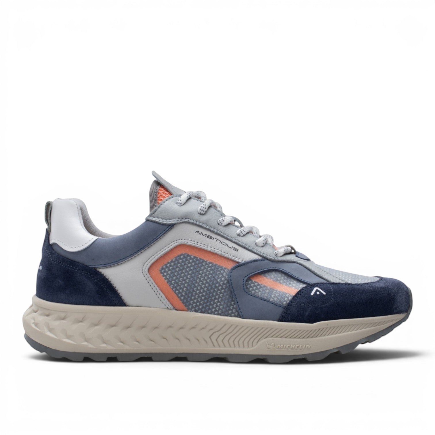 ShoeShop Ambitious Venture sneakers with navy, grey, and orange accents. Leather and textile upper with Michelin sole.