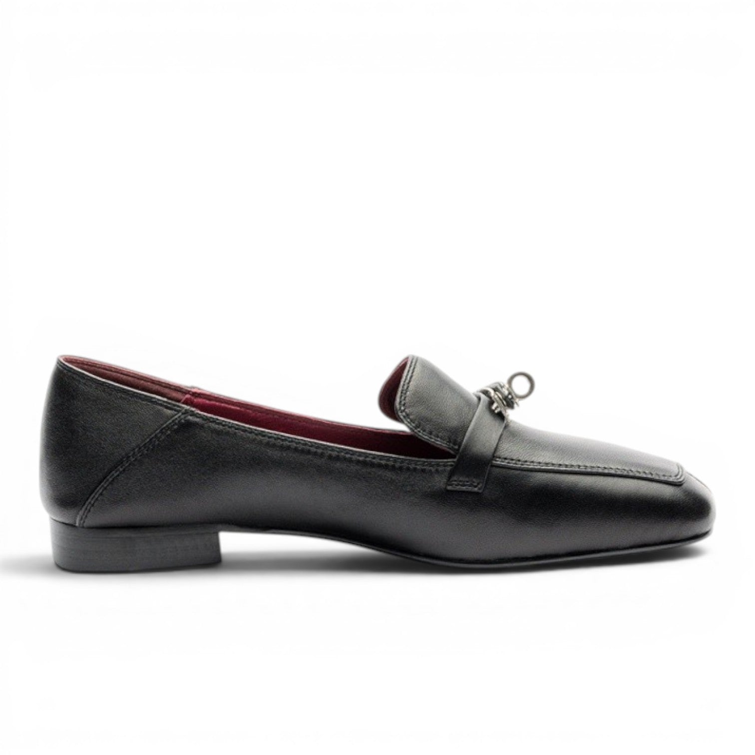 ShoeShop black leather loafers with metal accent and red lining.