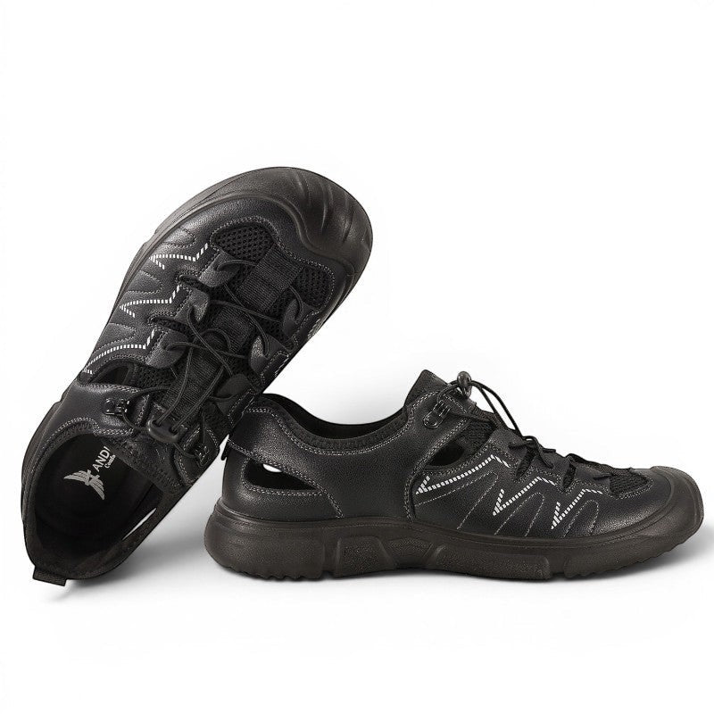 ShoeShop black leather and mesh sandals with bungee laces and cut-out sides. Model W2503.