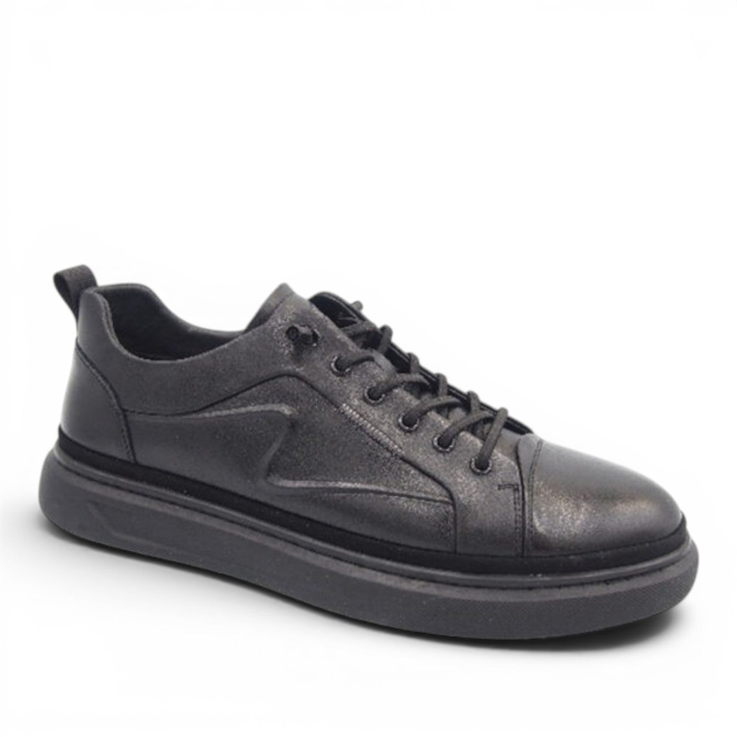 ShoeShop black leather low-top sneakers with a textured design and thick sole. Model W9405.