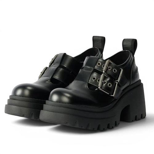 ShoeShop black faux leather platform shoes with double buckle straps and chunky heel.