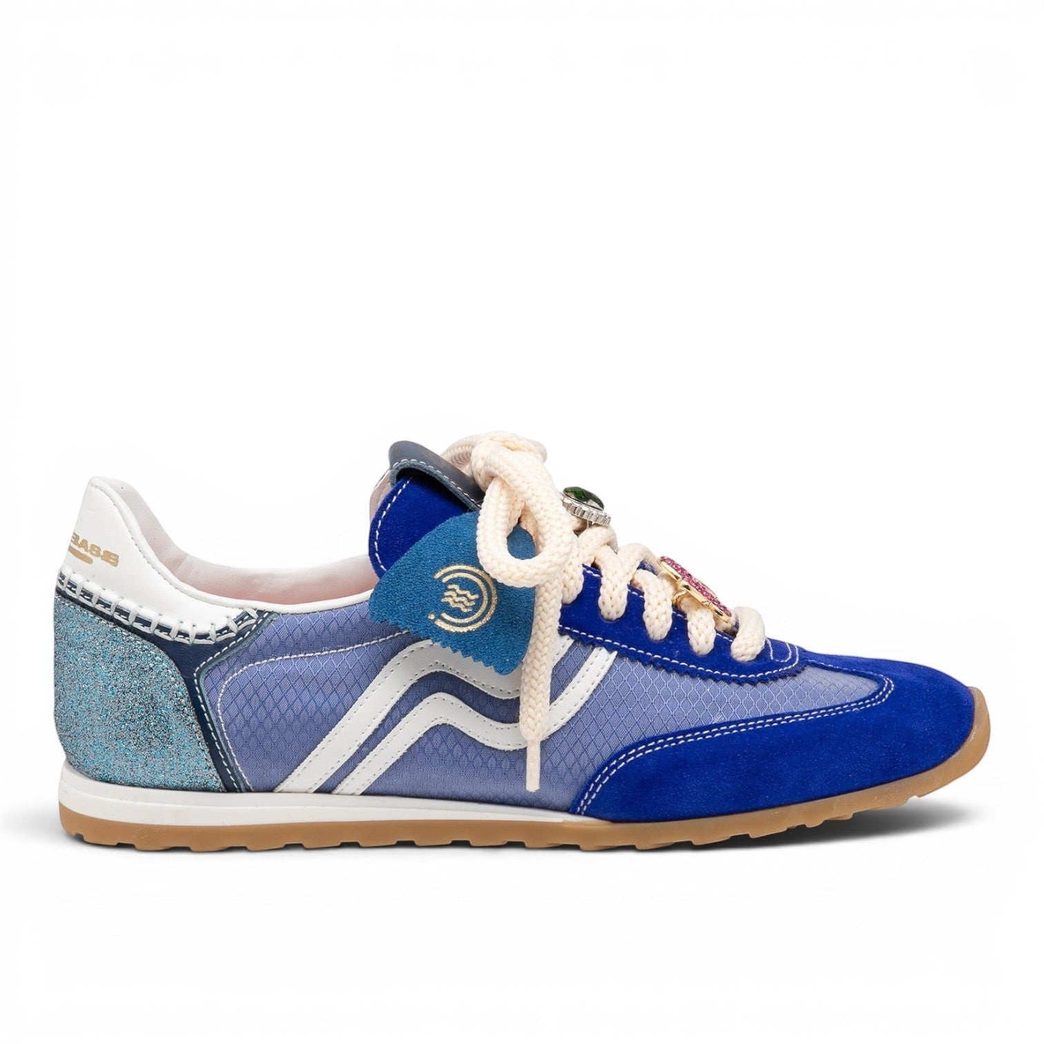 ShoeShop blue suede and mesh low-top sneakers with white stripes and jewel-like lace details.