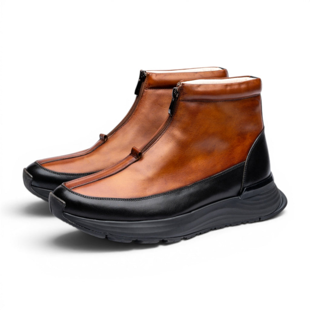 ShoeShop brown and black leather sherpa-lined zip-up ankle boots with contrast sole.