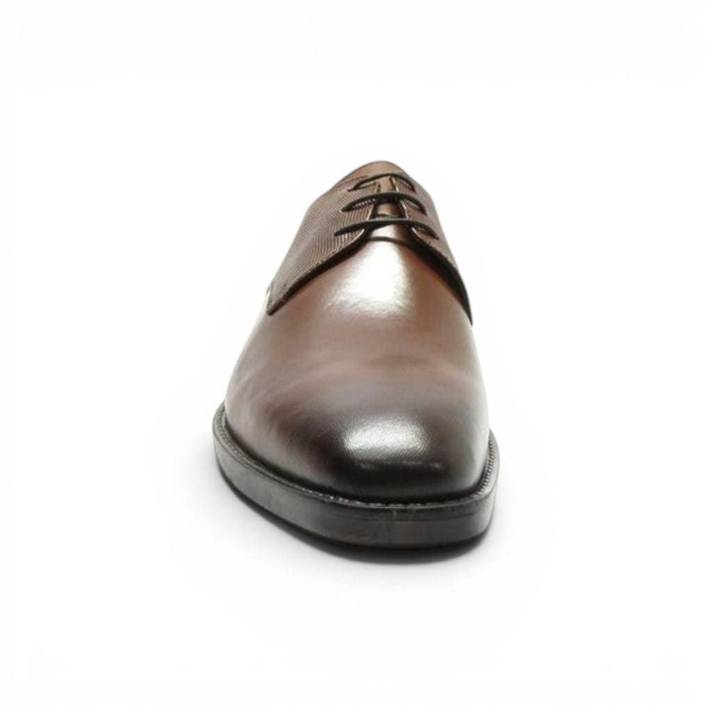 ShoeShop brown leather derby shoe with textured quarter and lace-up closure.