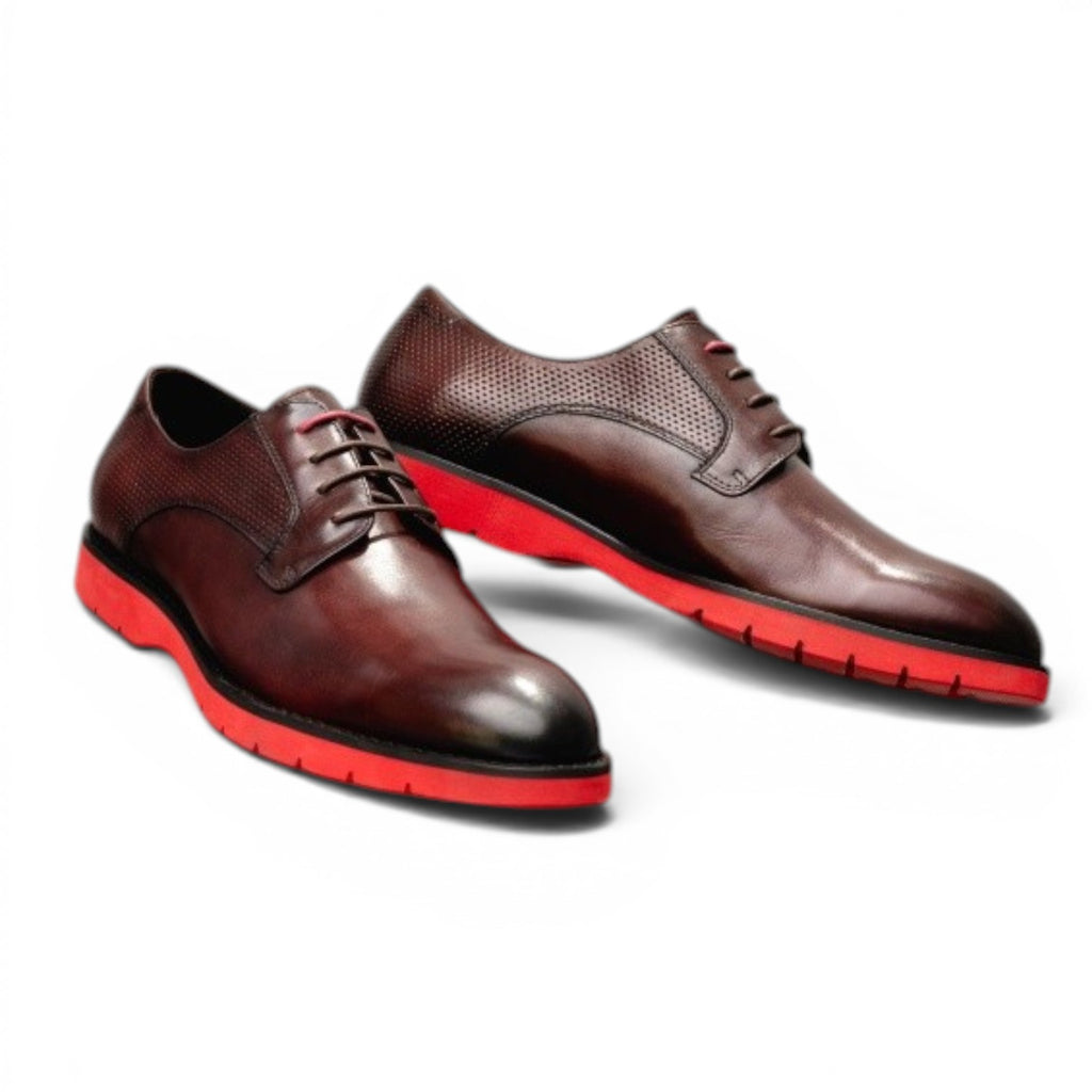 ShoeShop brown polished leather derby shoes with red rubber sole and perforated detailing.
