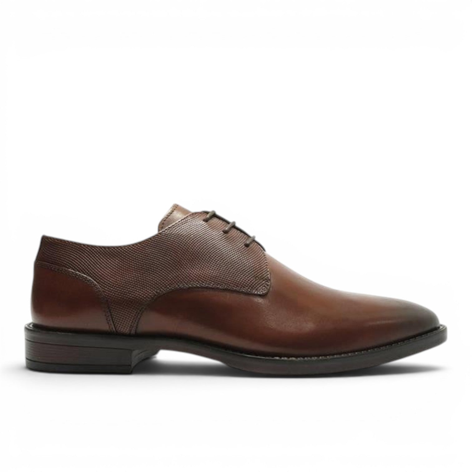 ShoeShop brown leather dress shoe with textured fabric accents and lace-up closure.