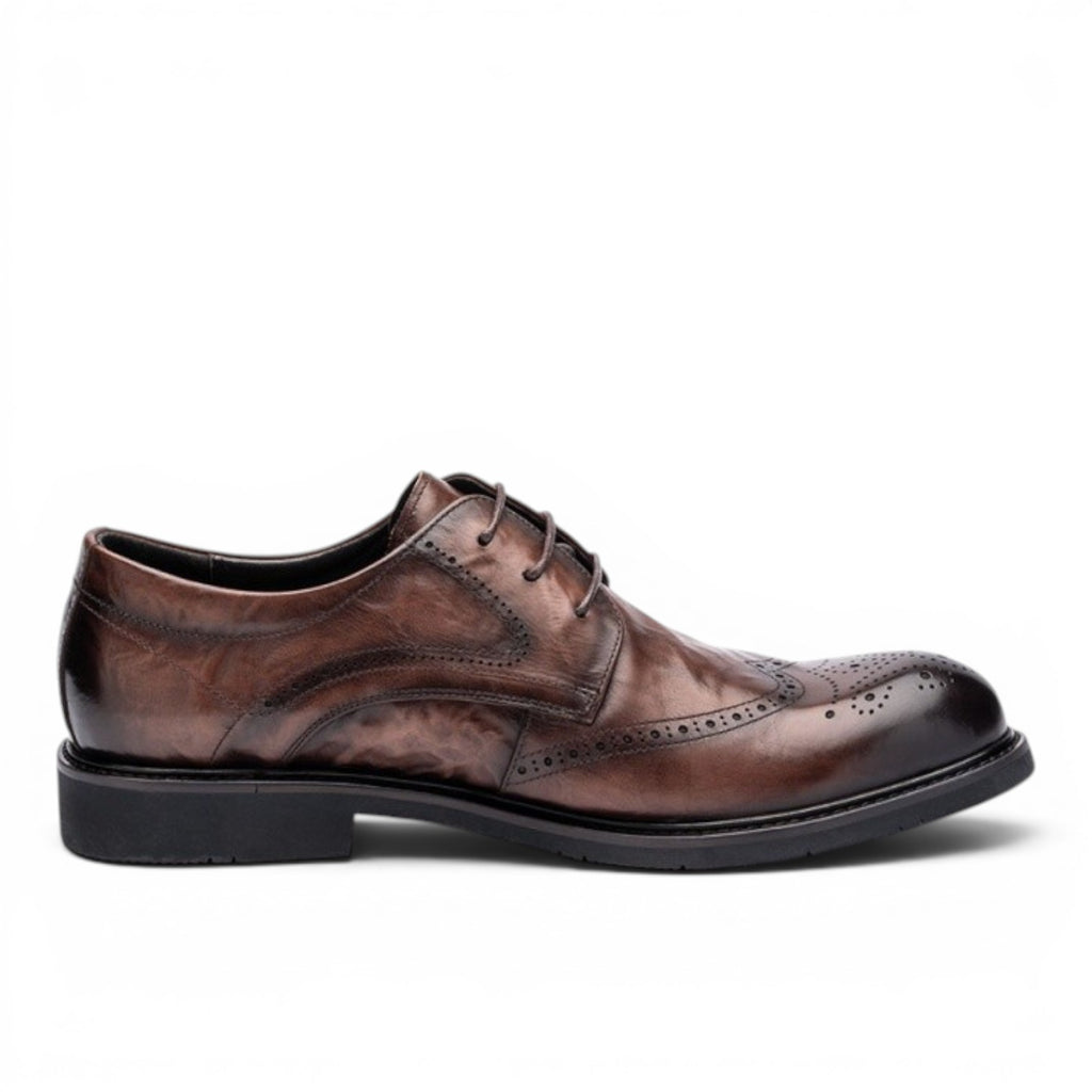 ShoeShop brown leather wingtip brogue dress shoes with decorative perforations and lace-up closure.