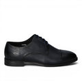 ShoeShop dark blue leather cap toe oxford dress shoe with navy laces and stitched detailing.