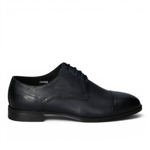 ShoeShop dark blue leather cap toe oxford dress shoe with navy laces and stitched detailing.