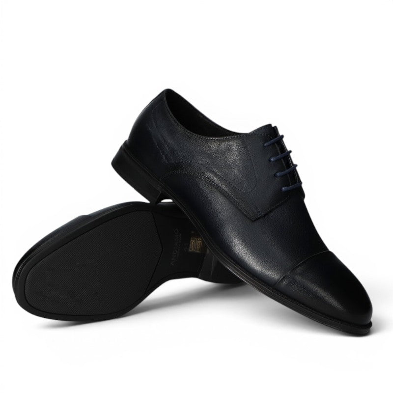 ShoeShop dark blue leather cap toe oxford dress shoes with blue laces.