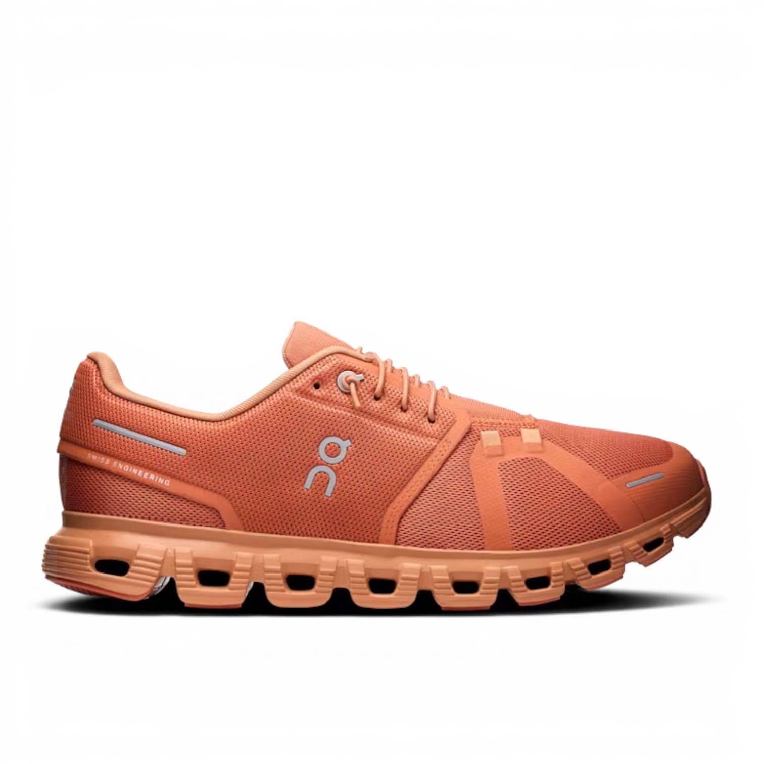 ShoeShopHere orange mesh ON Cloud 6 running shoes with white laces and reflective accents. Features CloudTec cushioning.