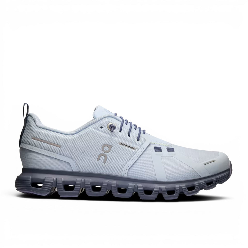 ShoeShop ON Cloud 6 Waterproof light blue recycled polyester running shoe with grey sole and laces.