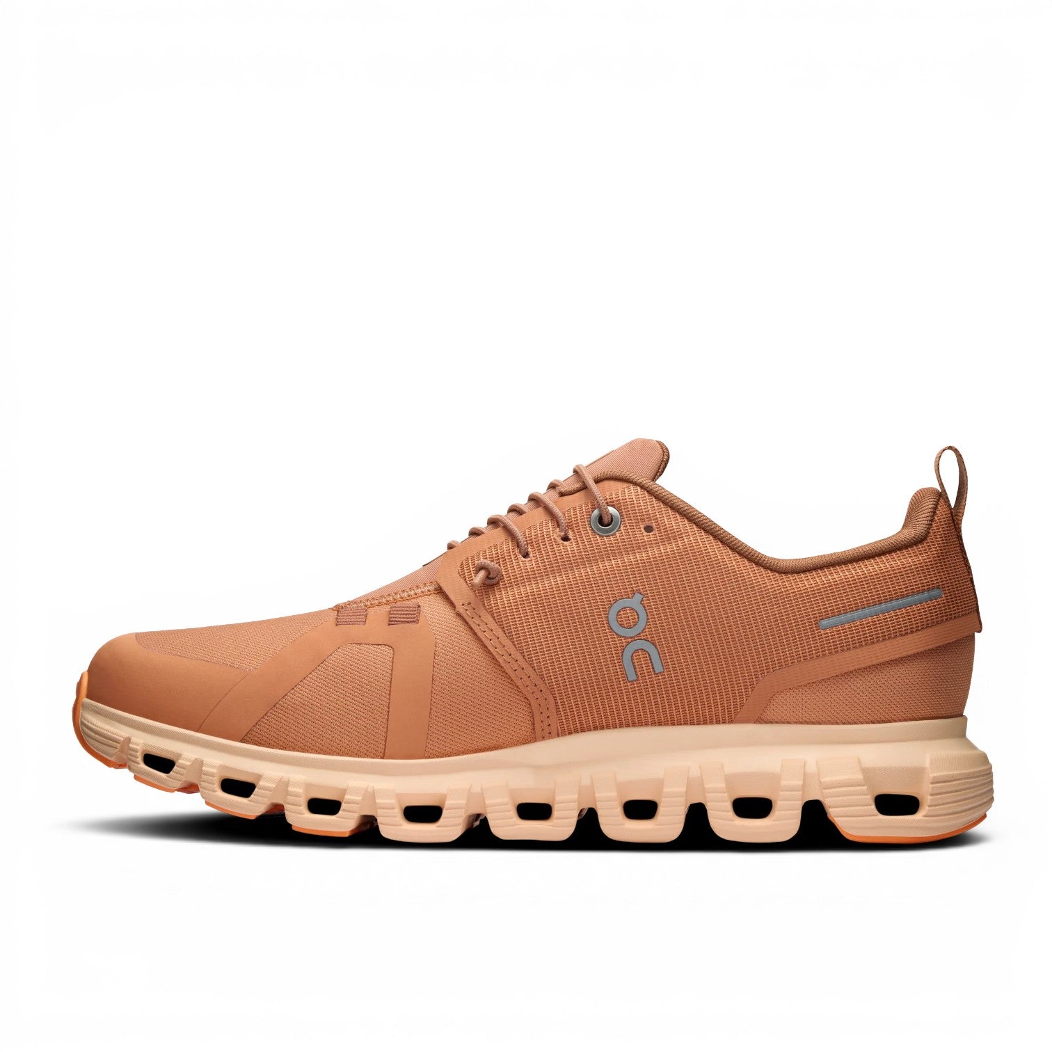 ShoeShop ON Cloud 6 Waterproof women's running shoes in tan, made from recycled polyester with a waterproof membrane and signature CloudTec sole.