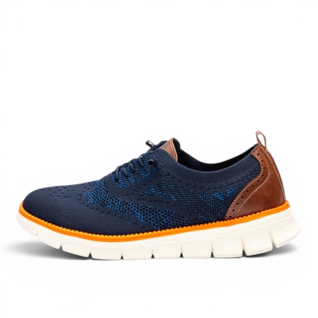 ShoeShop navy blue knit Juhan shoe with brogue details and orange sole accent. Breathable and flexible.
