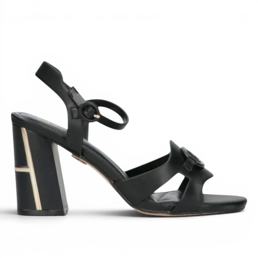 ShoeShop Laura Biagiotti 9051 black synthetic heeled sandals with ankle strap and decorative detail.
