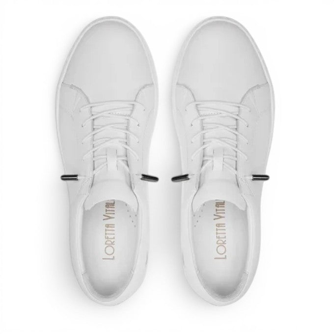 ShoeShop Loretta Vitale 5277 white leather low-top sneakers with lace-up closure and rubber sole.