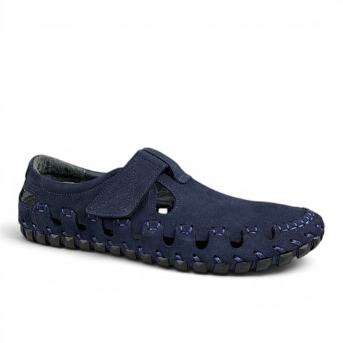 ShoeShop navy blue suede slip-on sandal with hook-and-loop strap and decorative stitching.