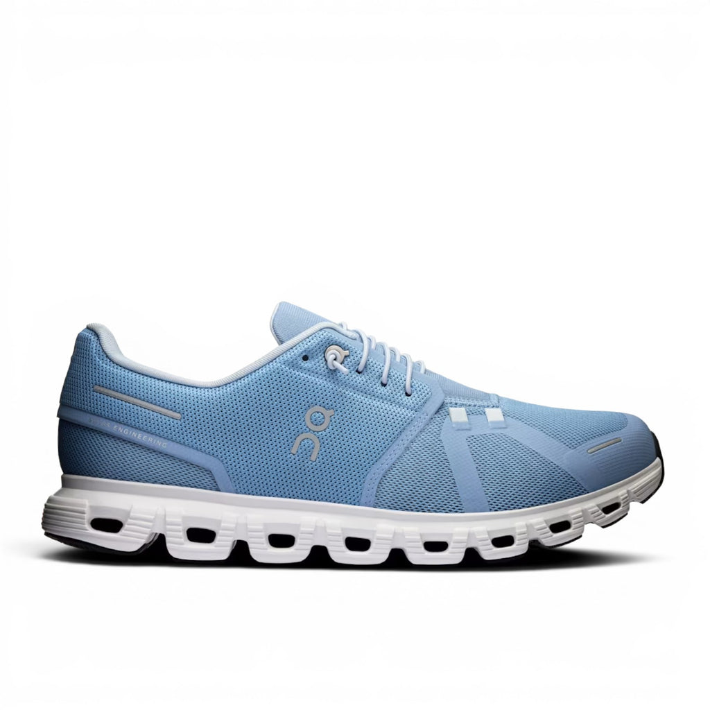 ShoeShop ON Cloud 6 light blue recycled polyester running shoe with white sole and CloudTec cushioning.