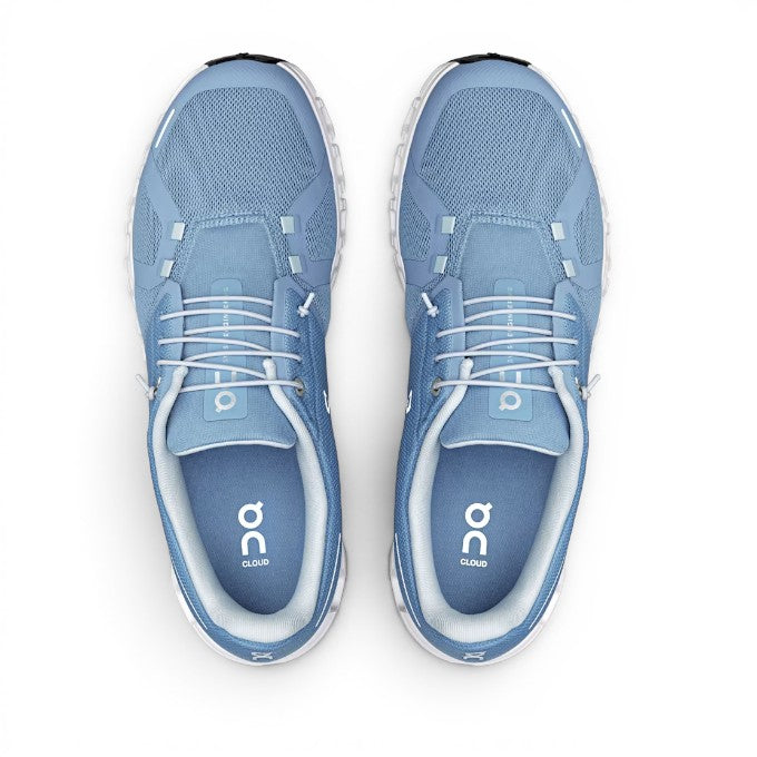 ShoeShop ON Cloud 6 blue recycled polyester running shoes with white laces and soles.