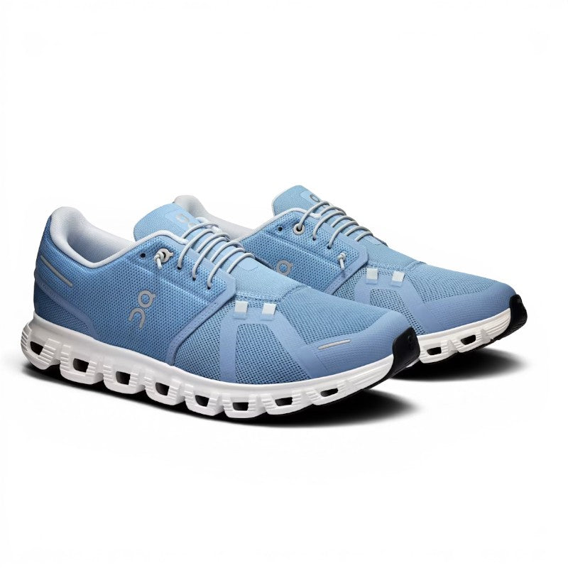 ShoeShop ON Cloud 6 light blue recycled polyester running shoes with white soles and laces.