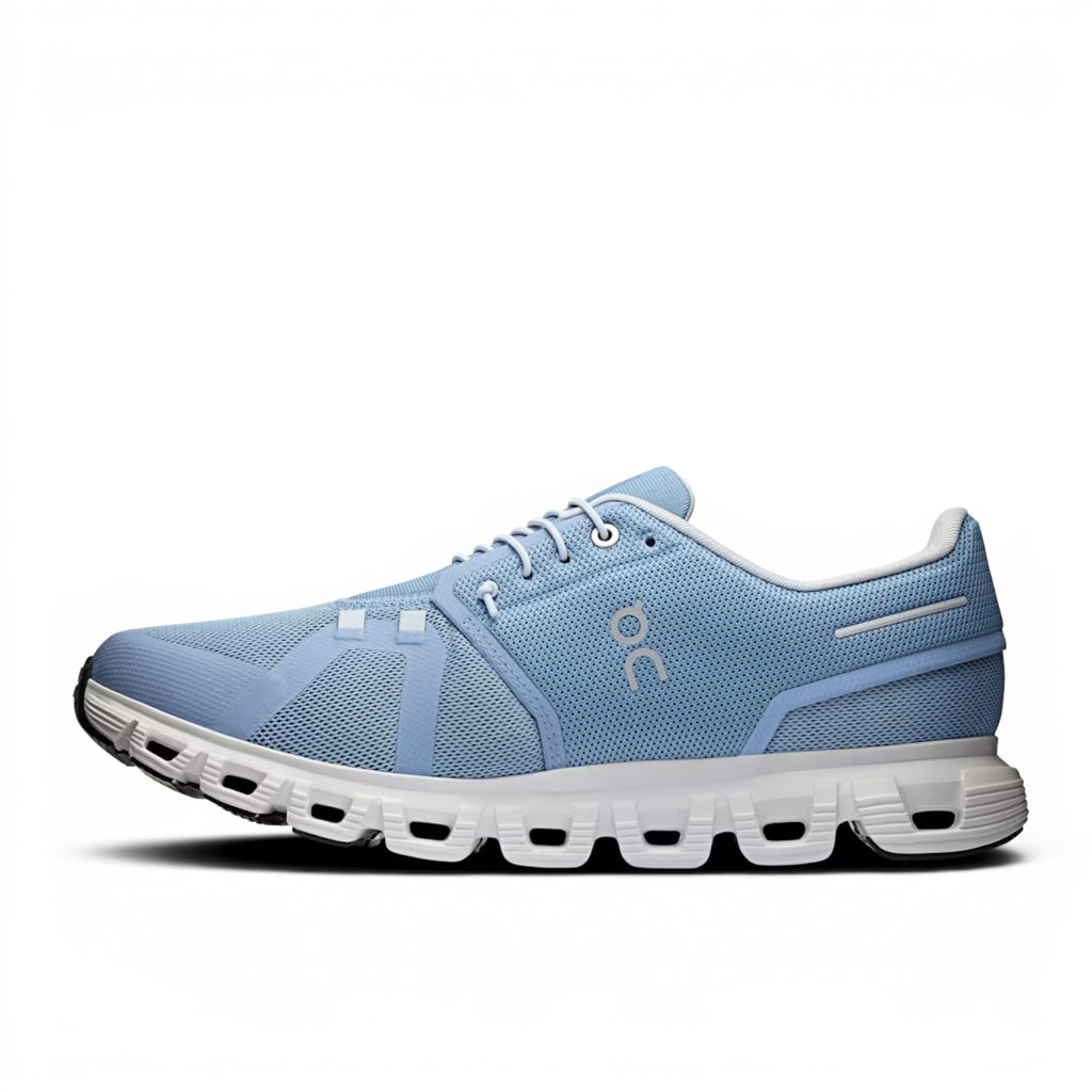 ShoeShop ON Cloud 6 light blue recycled polyester running shoe with white sole and laces.