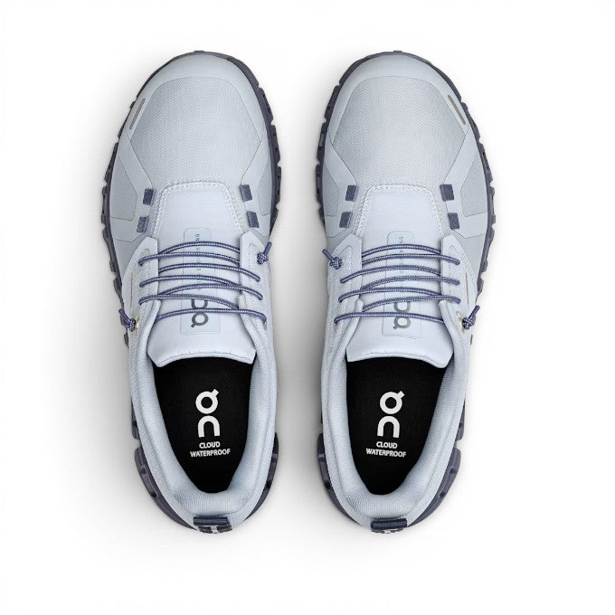 ShoeShop ON Cloud 6 Waterproof light blue recycled polyester running shoes with purple laces and black soles.