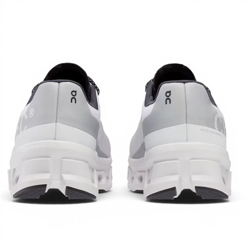 ShoeShop ON Cloud Cloudmonster white and grey running shoes with signature CloudTec sole.