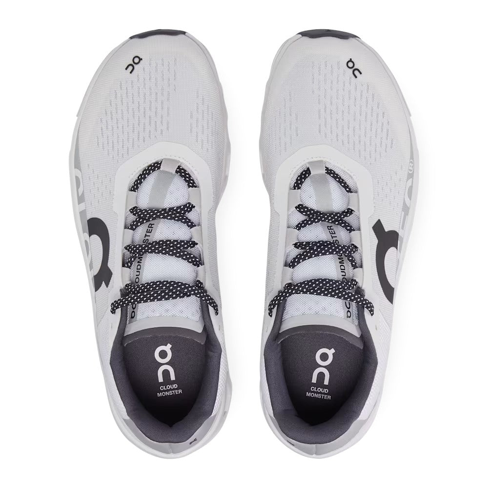ShoeShop ON Cloud - Cloudmonster white running shoes with black speckled laces and grey accents. Made from recycled polyester.