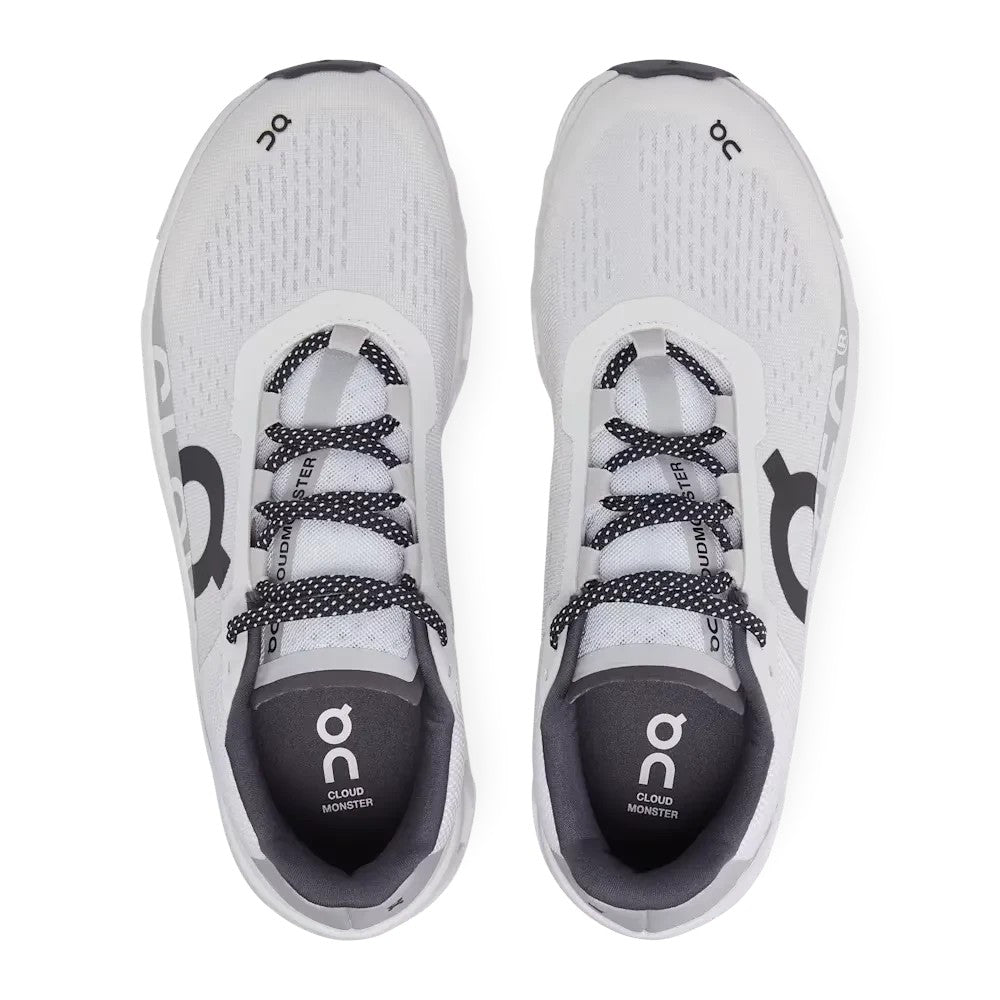 ShoeShop ON Cloud - Cloudmonster white running shoes with black speckled laces and grey accents. Made with recycled polyester.
