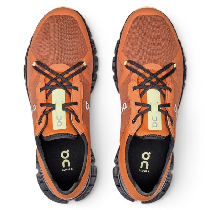 ShoeShop orange mesh and synthetic training shoes with black laces and yellow accents. Lightweight and breathable.
