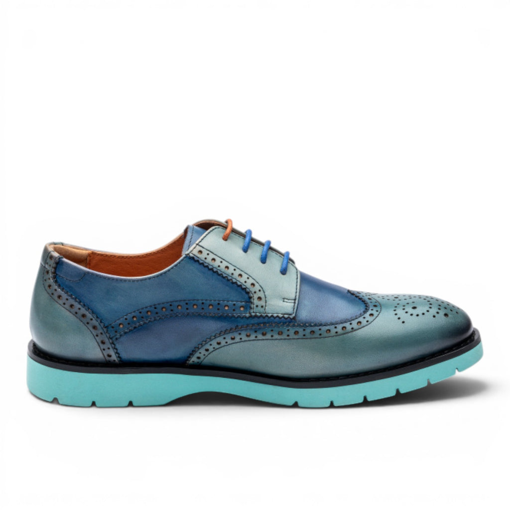 ShoeShop Uncle Paul FRIDA women's blue leather wingtip shoes with perforation detail and contrasting sole.