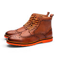 ShoeShop Uncle Paul HANNO brown leather wingtip boots with orange laces and sole.