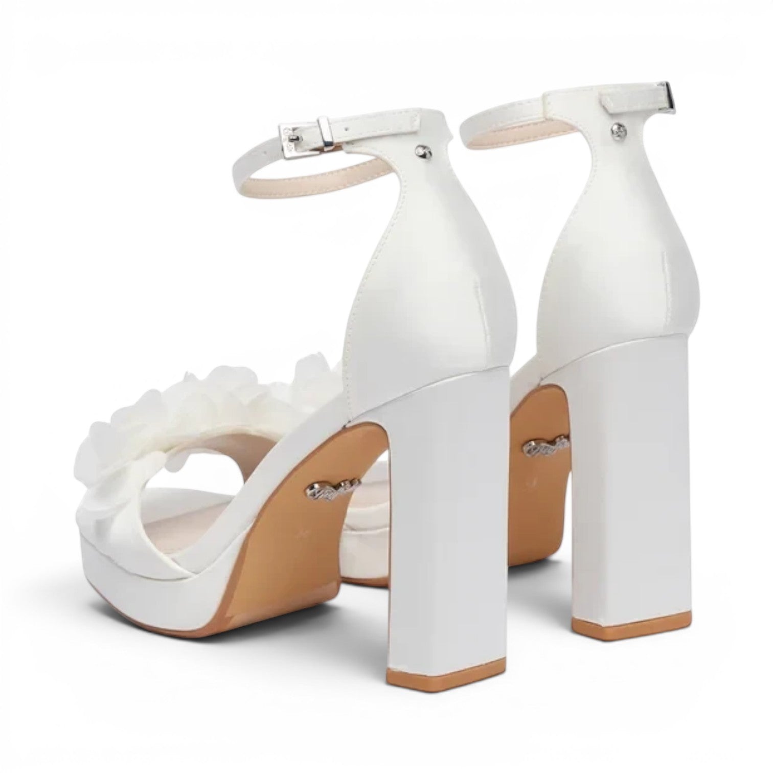ShoeShop white satin platform sandals with ankle strap and ruffled flower detail. Chunky block heel.