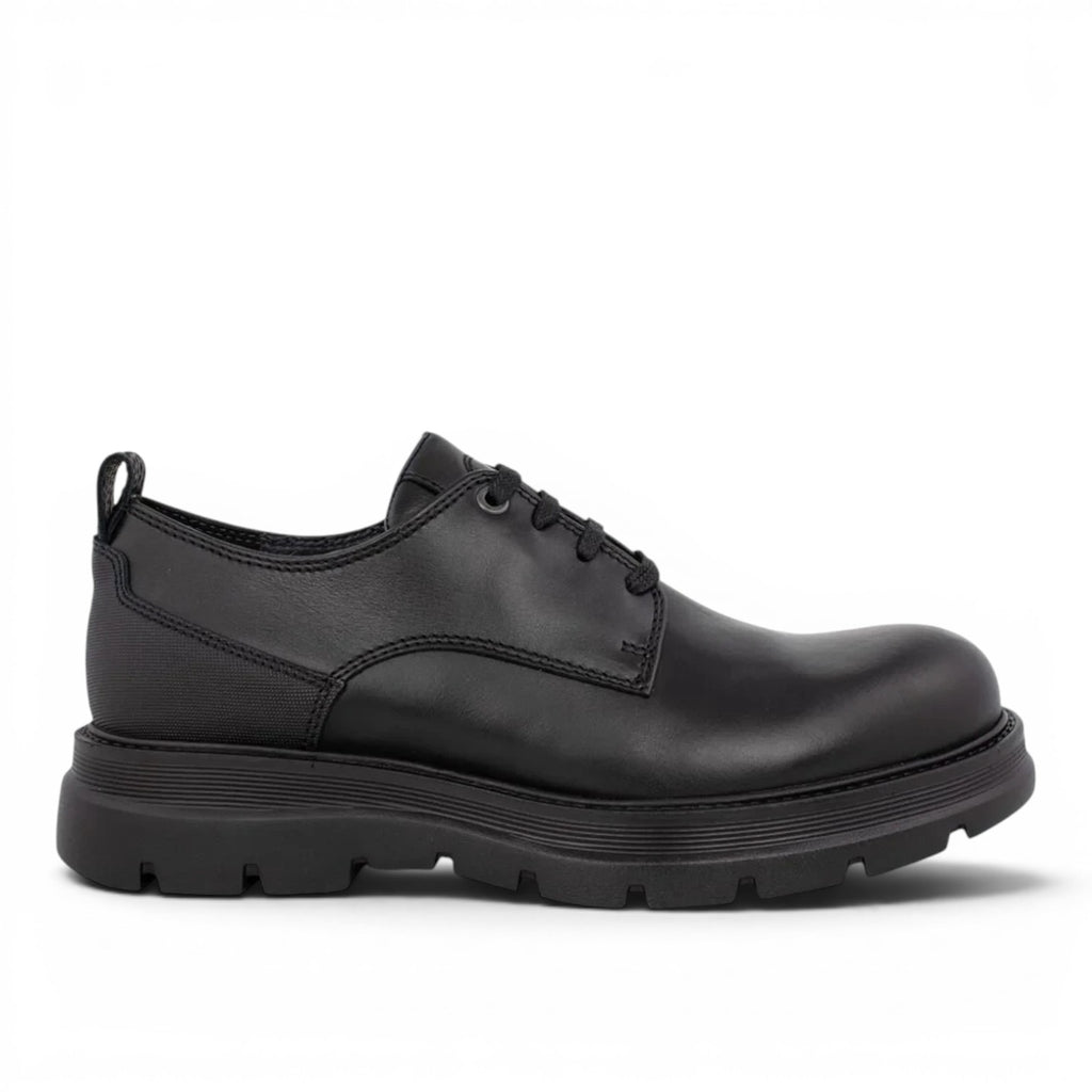 ShoeShop black leather derby shoe with a chunky sole and elasticated heel detail.